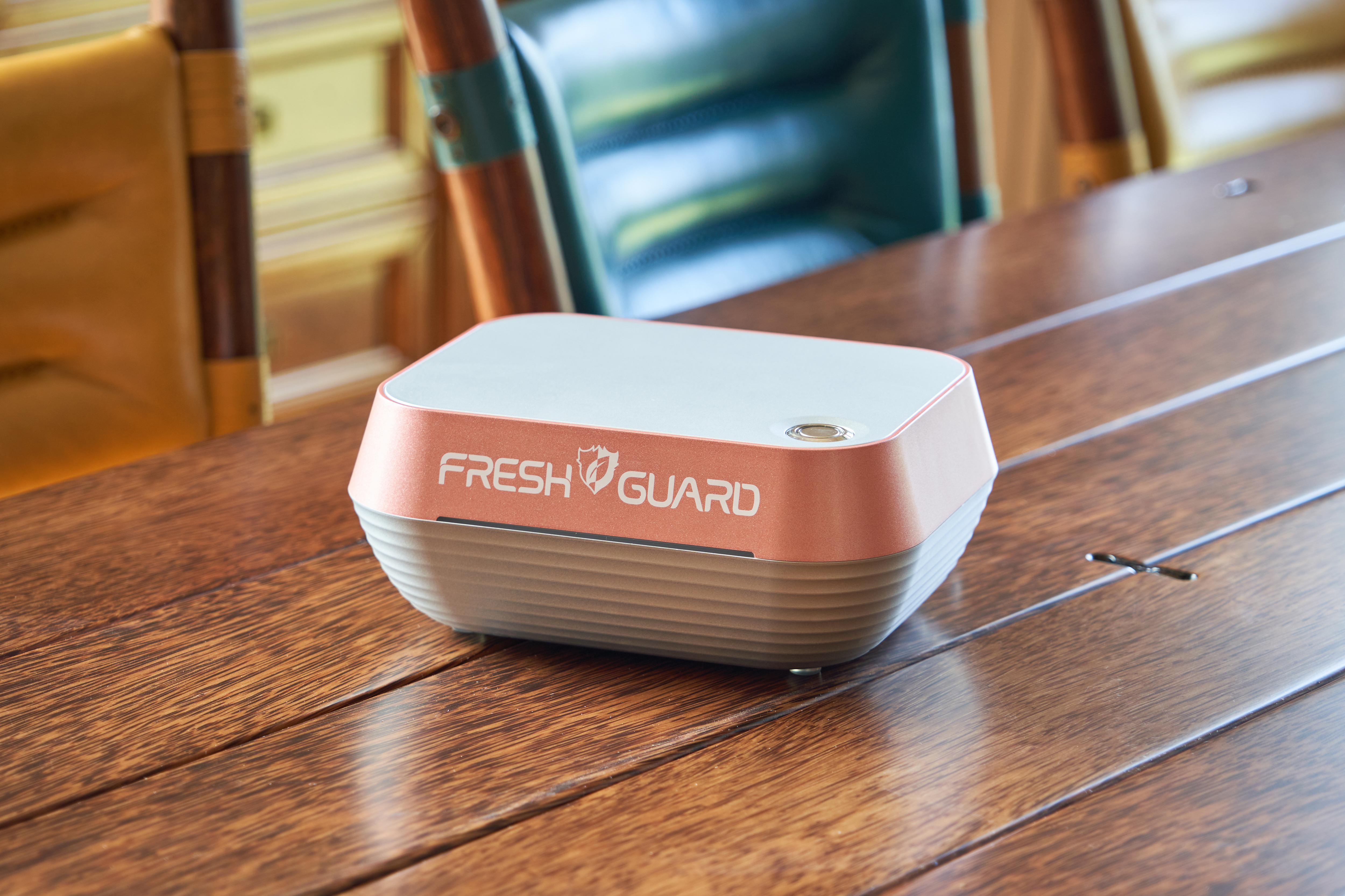 Fresh Guard device on a wooden dining surface